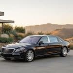 Black luxury sedan outside a modern Calabasas home
